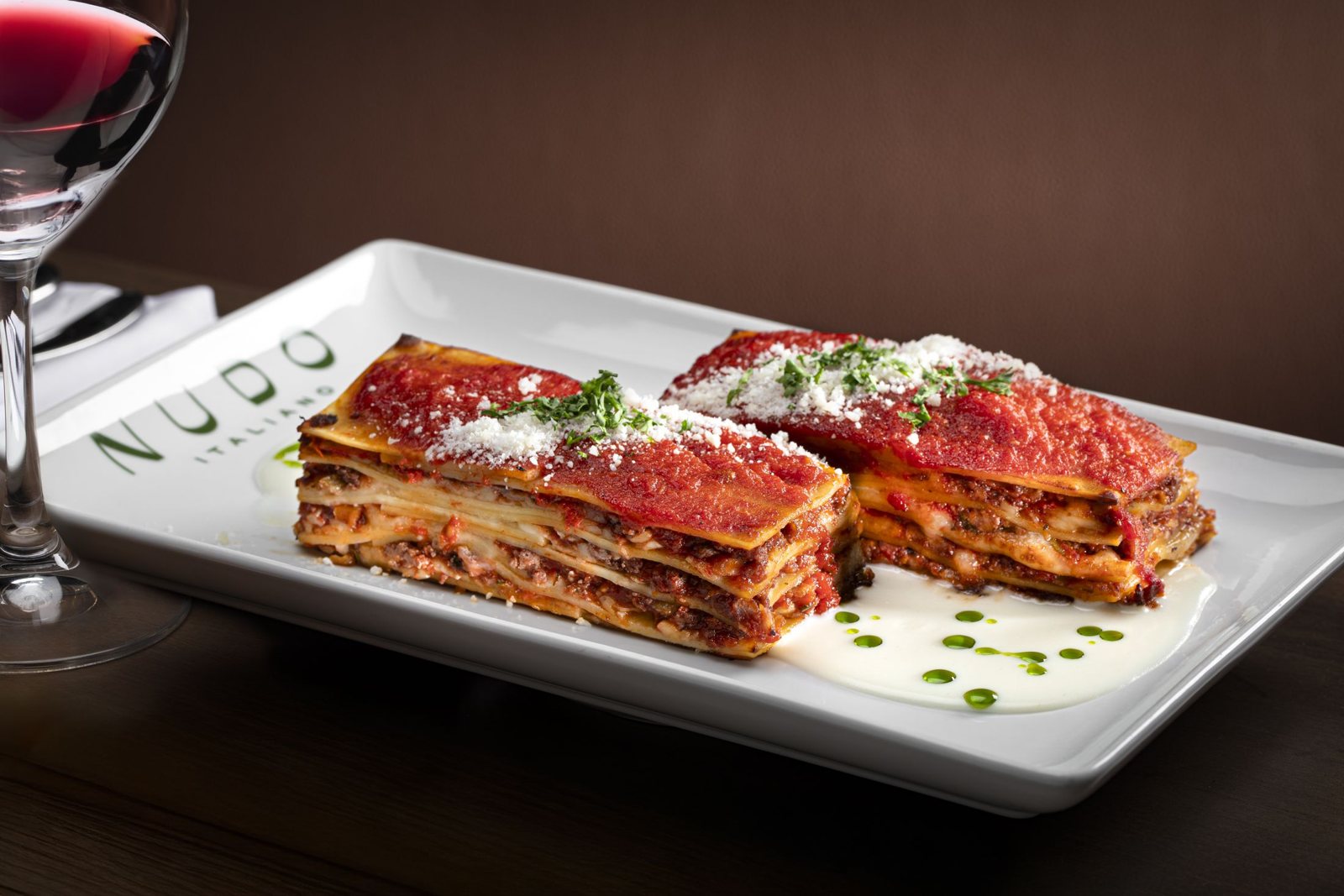 Layers of house-made lasagna with tomato sauce and cheese