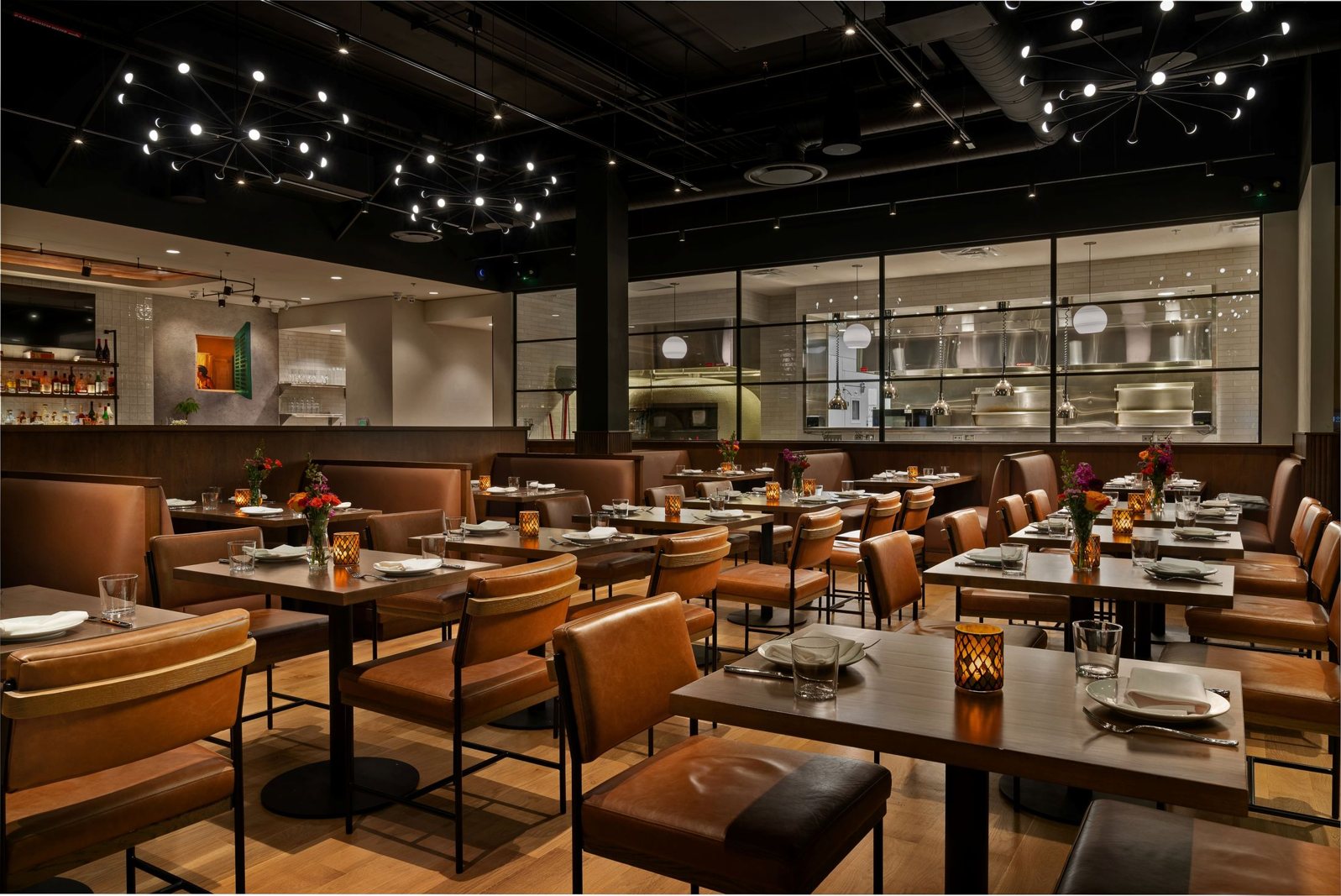 The dining room looking into the open kitchen at Nudo Italiano